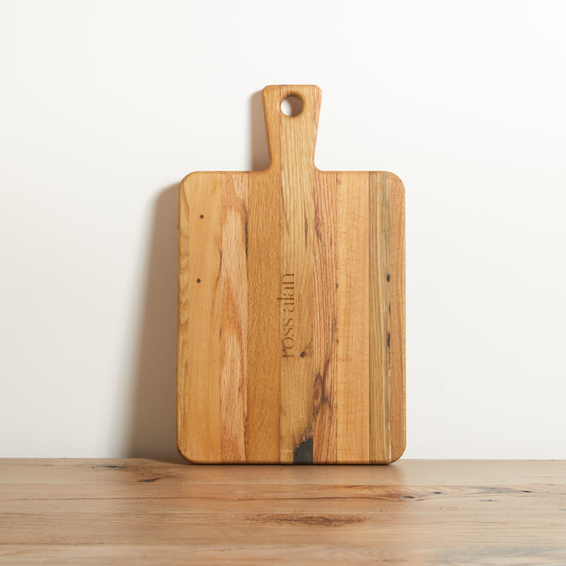 Reclaimed Oak rectangle cutting board with handle. Natural oak color with grain